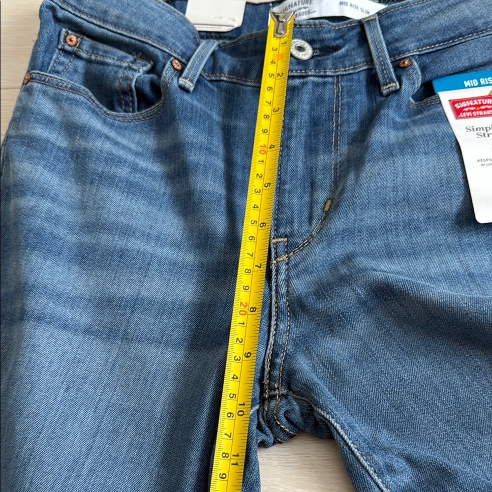 3/$10 Levi's Blue Mid Rise Slim Jeans - Picture 9 of 10
